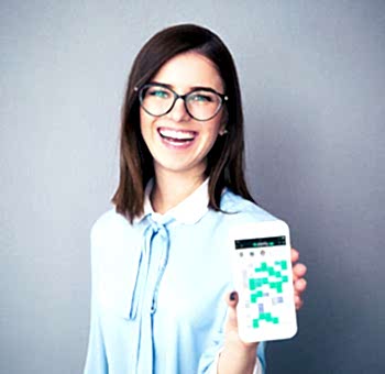 Smiling optician managing her appointments on Planfy using her smartphone.